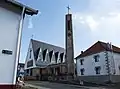 église