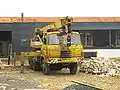 Grue mobile dont le carrossage est positif.