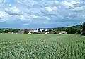 Champs de blé et quartiers neufs.