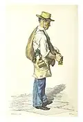 Homme avec un chapeau de paille vendant de l'huile