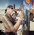 Artiste peintre à l'œuvre en 2010.