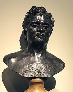 Buste en bronze d'un homme moustachu épaules nues