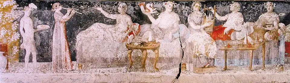 Scène de banquet, tombe d'Agios Athanasios (près de Thessalonique), v. 325-300.