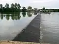 Barrage, depuis la rue Galante.