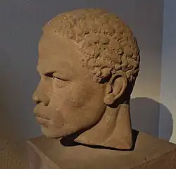 Tête de l'Afrique (1863), pierre, fragment de l'ancienne fontaine Bruat.