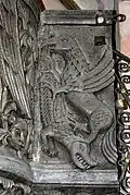 Lutte entre un griffon et un crocodile