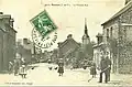Baulon ː la rue principale du bourg au début du XXe&nbsp;siècle (carte postale).
