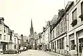 Bazouges-la-Pérouse ː la place du Monument aux morts en 1947 (carte postale).