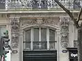 No&nbsp;19 : encadrement de porte avec têtes de lion.