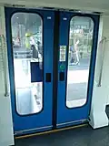 Porte automatique des automotrices Be 4/6.