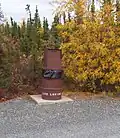 Poubelle installée dans un parc naturel et conçue pour résister à la curiosité des ours (Canada).