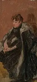Femme assise avec une cape bordée de fourrure, années 1890