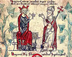 Enluminure montrant deux hommes en pleine discussion, celui de gauche portant une couronne et celui de droite une mitre.