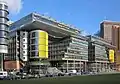 Centre commercial de Tiergarten Potsdamer Platz à Berlin, conçue par un  pionnier de l'architecture industrielle contemporaine, Richard Rogers, en 1998. (Illustre les questions: "Une architecture industrielle qui se poursuit ?  Un Style industriel qui est établi ?").