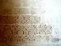 Peinture murale - motifs ornementaux au pochoir.