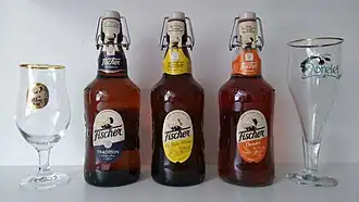 Bouteilles et verres de Fischer Tradition, Doreleï et La Belle Mira.