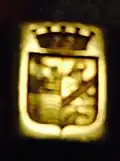 Le blason gravé sur une chevalière.