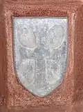 Écu des comtes de Comminges. De gueules, aux quatre otelles d'argent, adossées et posées en sautoir.