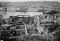 Bombardement de Lyon par l'aviation alliée, le 26 mai 1944, quai de Serin, n° 54 (vue prise de la rue Niepce ; la gare d'eau en arrière plan).