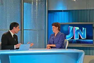 William Bonner, présentateur du journal, interviewant la présidente du Brésil Dilma Rousseff en 2011.