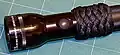Bonnet turc 7x11 (bonnet turc large) triplé, ici pour améliorer la prise en main de cette lampe torche Maglite.
