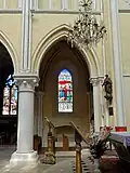 7e&nbsp;grande arcade du nord, avant le clocher.