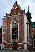 La façade et sa rosace (XVIe&nbsp;siècle).