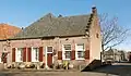 Bronkhorst, l'ancienne ferme (composée d'une maison transversale à pignon droit en escalier).
