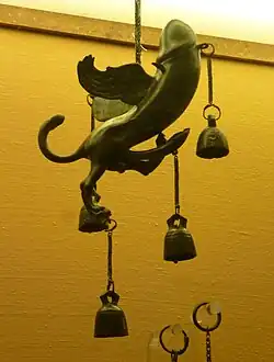 Amulette en bronze en forme de "phallus volant".