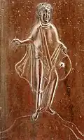 R14. Homme avec bouclier et objet non interprété.