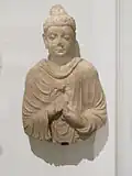 Buddha. Hadda, monastère de Tapa-Kalan. IIIe - IVe&nbsp;siècle. Stuc. Fouilles de la DAFA, Mission Jules Barthoux. 1926-27.