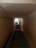 Escalier pour remonter du bunker à la surface.