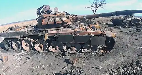 Deux chars détruits durant la bataille dans le Donbass, à la fin août. Présentés comme ukrainiens par la source, leur origine est cependant controversée.