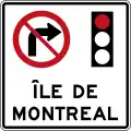 Panneau à l'île de Montréal interdisant de tourner à droite au feu rouge.