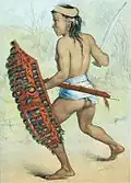 Un danseur dayak. Lithographie de C.F. Kelley, dessin de Carl Bock.