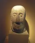 Tête de guerrier galaïco-romain du castro de Rubiás - Musée archéologique de Ourense.