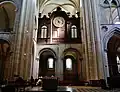 La tribune du transept supportant l'horloge.