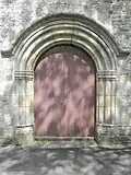 Porte de l'église Saint-Hubert (XVIe&nbsp;siècle).