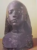 Tête de fillette(1897). Bronze