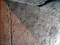 Graffiti du XVIe&nbsp;siècle à l'intérieur du donjon avec les dates les plus anciennes du château.