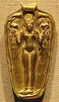 Pendentif représentant une femme nue.