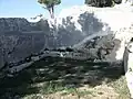 Citerne en partie rupestre comblée