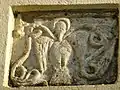 Un bas-relief de l'ancienne église.