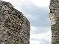 Vue du départ de l'arc à encadrement en tuffeau.