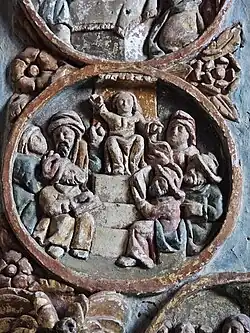 Retable du rosaire, médaillon de Jésus au temple