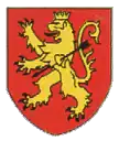 Blason signalant la route touristique "Richard Coeur de Lion", « de gueules au lion rampant au cœur transpercé d'une flèche »