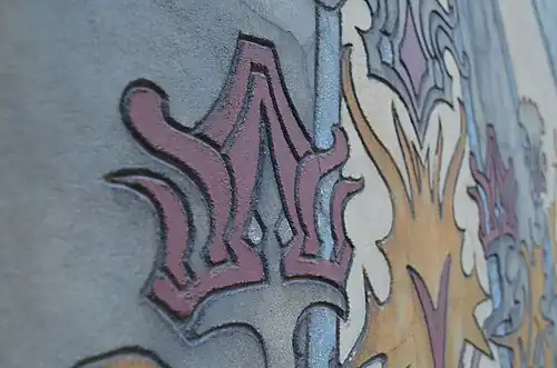 Détail du dessin gravé dans le mortier (Gabriel Van Dievoet, 1899), Charleroi, Maison dorée.
