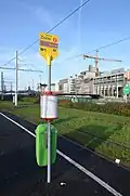 Logo « TEC » sur un totem de l'arrêt Sambre