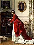 Femme écrivant une lettre.
