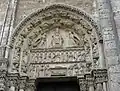 Tympan : (de haut en bas) la Vierge sur le Trône ; la présentation de Jésus au Temple ; Annonciation, Visitation et Nativité
